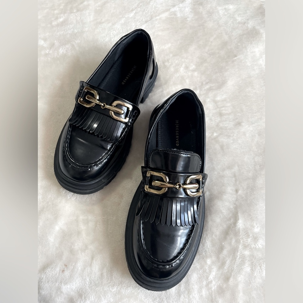Reserved Kids Black Moccasins with Gold Accent